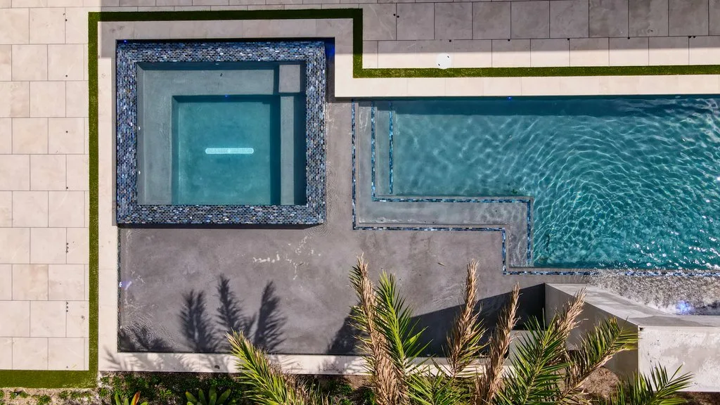 Pool deck and landscaping from above, custom pool and spa in Boca Raton, FL
