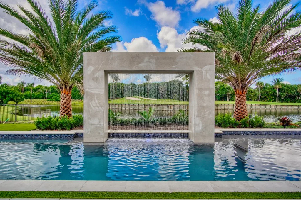 Porcelain water feature and French Silver plaster, custom pool and spa in Boca Raton, FL