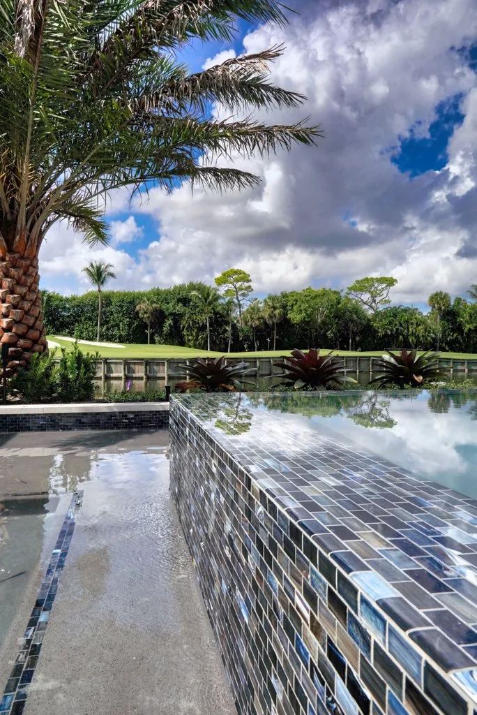 Finished pool with water feature, custom pool and spa in Boca Raton, FL