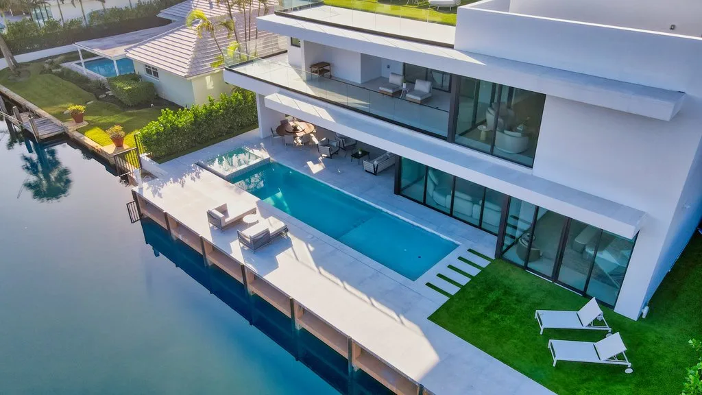 Waterfront backyard pool from above, Golden Harbour, custom pool builder in Boca Raton, FL