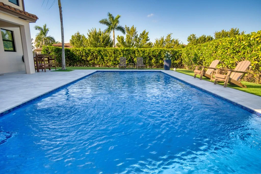 Pool steps capped with two rows of cobalt glass tile