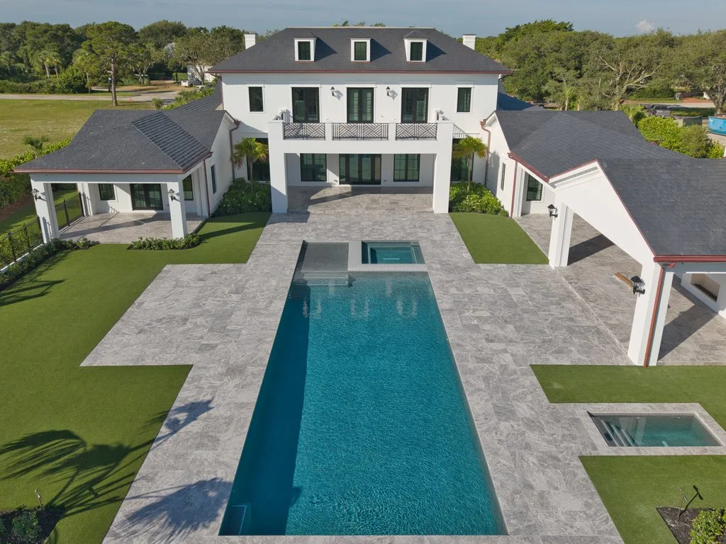 Aerial of estate pool and spa at a Bears Club home in Jupiter, custom pool builder in Jupiter, FL
