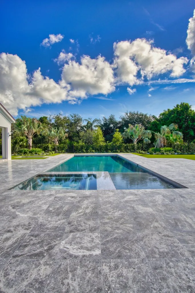 Finished pool and spa with landscape views, custom pool builder in Jupiter, FL