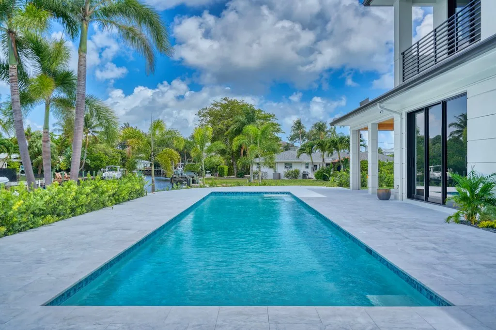 Completed pool and marble deck, custom pool builder in North Palm Beach, FL